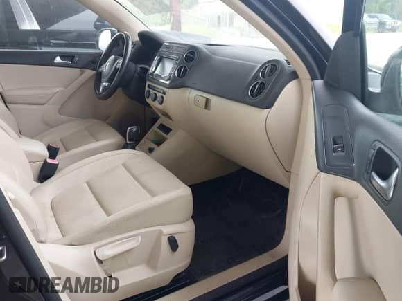 2015 Volkswagen Tiguan S with VIN WVGAV7AX5FW591728, listed as a IAAI auction lot 43205069 with 81,126 mi miles and . Bid and sale history available at DreamBid. Image 5.