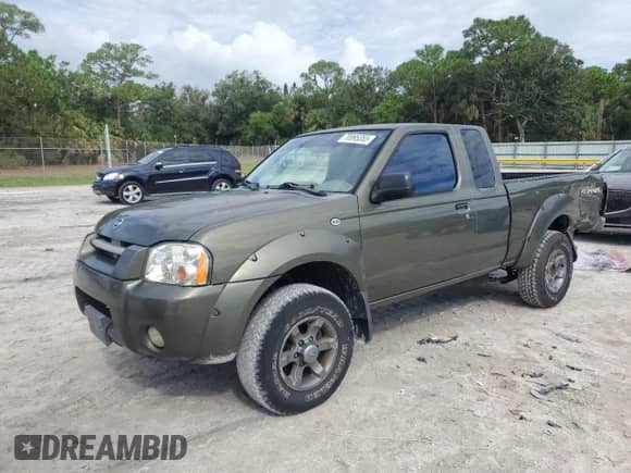 2003 Nissan Frontier XE z VIN 1N6ED26T23C452359, wystawiony jako Copart lot #70995355 z przebiegiem 168 490 mil mil oraz Szkoda całkowita • Salvage title. Historia ofert i sprzedaży dostępna na DreamBid. Obrazek 1.