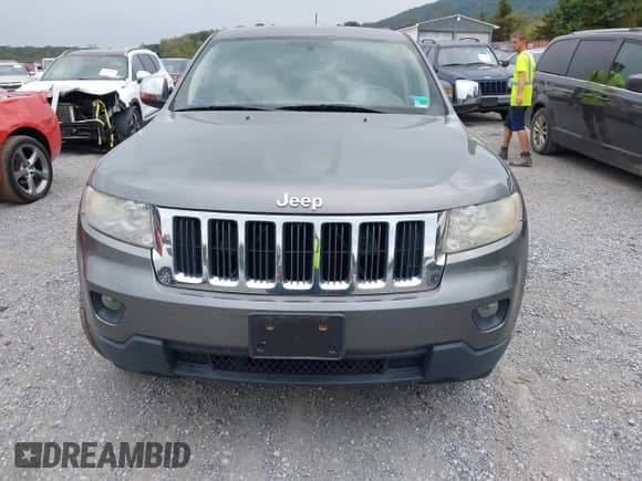 2012 Jeep Grand Cherokee Laredo with VIN 1C4RJFAG3CC272631, listed as a IAAI auction lot 43291923 with 168,220 mi miles and . Bid and sale history available at DreamBid. Image 13.