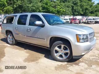 2013 Chevrolet Suburban LTZ z VIN 1GNSCKE07DR108483, wystawiony jako IAAI lot #42579856 z przebiegiem 179 622 mil mil oraz . Historia ofert i sprzedaży dostępna na DreamBid. Obrazek 1.