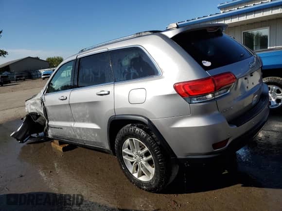 2018 Jeep Grand Cherokee Laredo with VIN 1C4RJFAG5JC302824, listed as a Copart auction lot 80457575 with 178,669 mi miles and Salvage title. Bid and sale history available at DreamBid. Image 2.