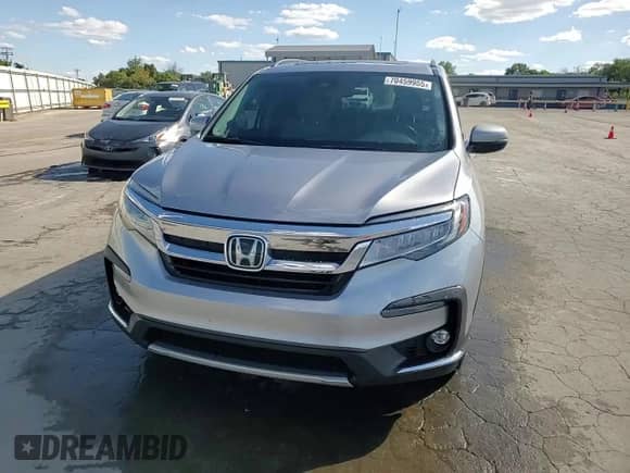 2022 Honda Pilot Touring 7-Passenger with VIN 5FNYF5H6XNB017260, listed as a Copart auction lot 70459955 with 47,527 mi miles and Salvage title. Bid and sale history available at DreamBid. Image 14.