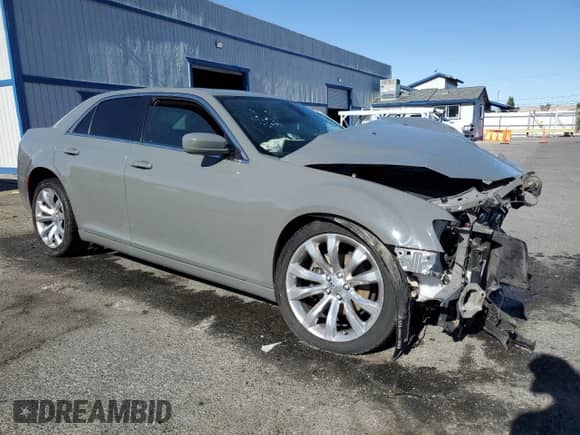 2017 Chrysler 300 Limited with VIN 2C3CCAAG5HH668040, listed as a Copart auction lot 57256155 with 134,784 mi miles and Salvage title. Bid and sale history available at DreamBid. Image 4.