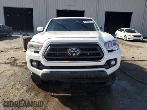 2023 Toyota Tacoma SR5 z VIN 3TMAZ5CN4PM217525, wystawiony jako Copart lot #82028615 z przebiegiem 22 100 mil mil oraz Szkoda całkowita • Salvage title. Historia ofert i sprzedaży dostępna na DreamBid. Obrazek 5.