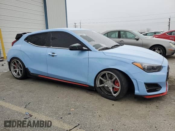 2019 Hyundai Veloster N с VIN KMHT36AH7KU002296, выставлен на аукционе Copart как лот 83427504 с пробегом 54 898 миль миль и Списание • Salvage title. История ставок и продаж доступна на DreamBid. Изображение 4.
