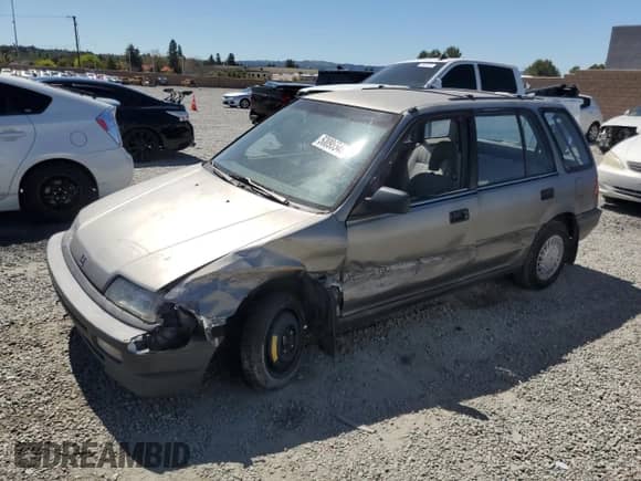 1990 Honda Civic with VIN JHMEE2752LS001520, listed as a Copart auction lot 50095545 with 456,252 mi miles and Salvage title. Bid and sale history available at DreamBid. Image 1.