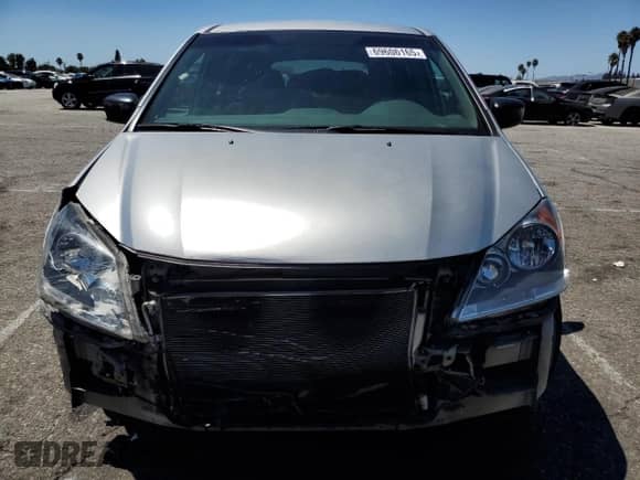 2009 Honda Odyssey LX с VIN 5FNRL38289B011221, выставлен на аукционе Copart как лот 69606165 с пробегом Не указан миль и Списание • Salvage title. История ставок и продаж доступна на DreamBid. Изображение 5.