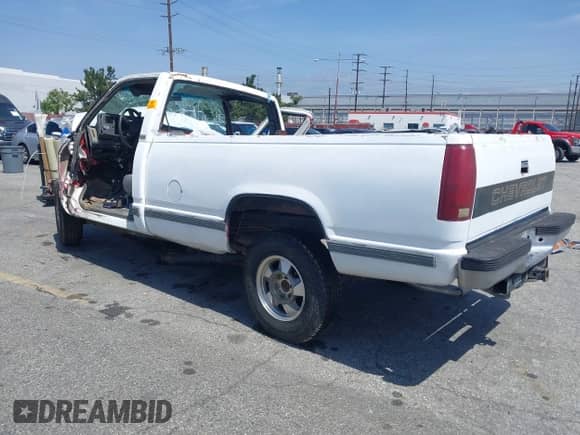 1990 Chevrolet Silverado 2500 с VIN 1GCFC24K2LE248413, выставлен на аукционе IAAI как лот 42283250 с пробегом 184 215 миль миль и . История ставок и продаж доступна на DreamBid. Изображение 3.