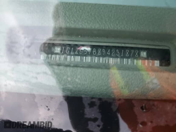 2009 Chevrolet Malibu 1LS with VIN 1G1ZG57B894231878, listed as a Copart auction lot 50231025 with 201,263 mi miles and Salvage title. Bid and sale history available at DreamBid. Image 14.