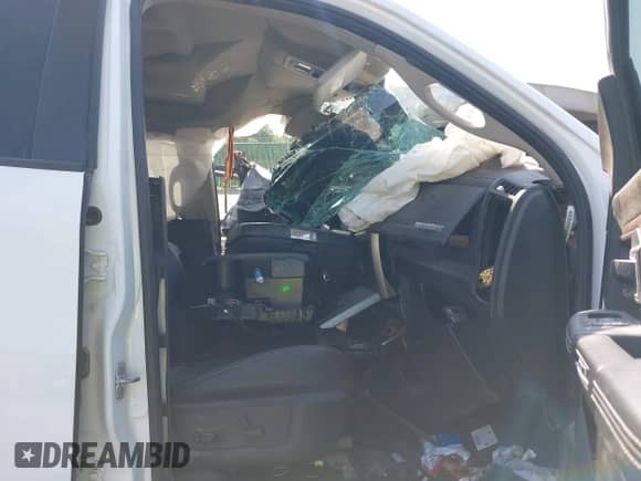 2014 Ram 1500 Laramie with VIN 1C6RR6NT9ES100703, listed as a IAAI auction lot 39869453 with Not provided miles and . Bid and sale history available at DreamBid. Image 5.