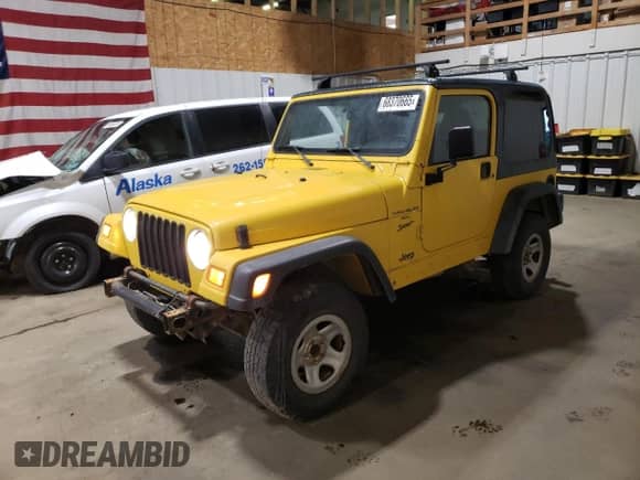 2000 Jeep Wrangler Sport z VIN 1J4FA49S7YP735946, wystawiony jako Copart lot #68370665 z przebiegiem 201 407 mil mil oraz Szkoda całkowita • Salvage title. Historia ofert i sprzedaży dostępna na DreamBid. Obrazek 1.
