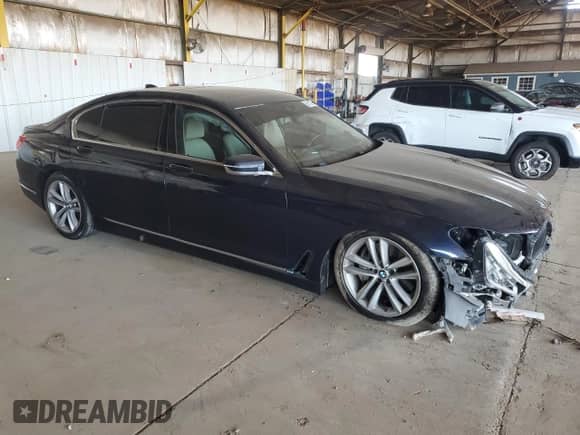 2016 BMW 7 Series 750i with VIN WBA7F0C5XGGL99115, listed as a Copart auction lot 65112705 with Not provided miles and Salvage title. Bid and sale history available at DreamBid. Image 4.