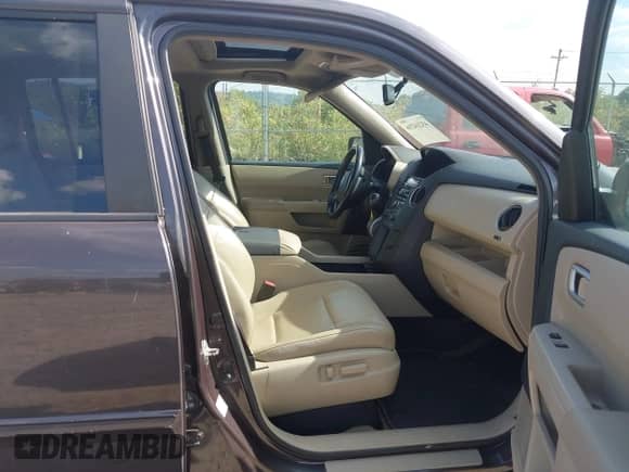 2014 Honda Pilot EX-L with VIN 5FNYF4H52EB015665, listed as a IAAI auction lot 43214216 with 140,041 mi miles and . Bid and sale history available at DreamBid. Image 5.