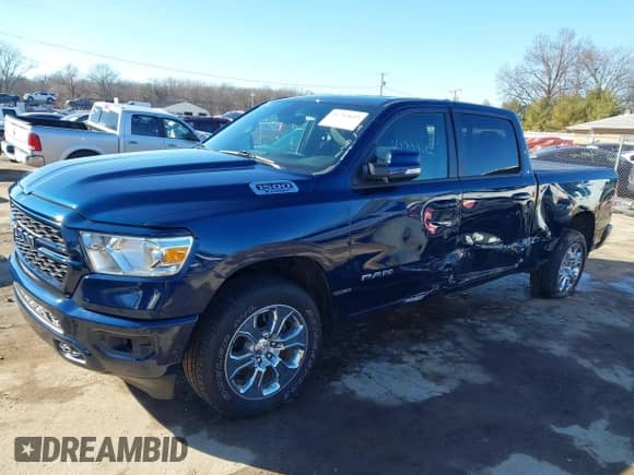 2022 Ram 1500 Big Horn with VIN 1C6RRFMG4NN438867, listed as a IAAI auction lot 41704632 with 22,125 mi miles and . Bid and sale history available at DreamBid. Image 6.
