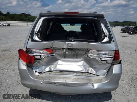 2010 Honda Odyssey EX с VIN 5FNRL3H42AB043863, выставлен на аукционе Copart как лот 71588935 с пробегом 200 740 миль миль и Списание • Salvage title. История ставок и продаж доступна на DreamBid. Изображение 6.