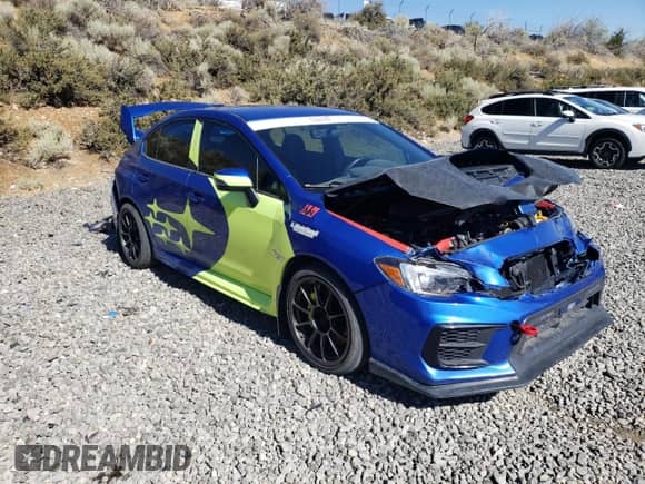 2020 Subaru WRX STI with VIN JF1VA2E66L9813716, listed as a Copart auction lot 57090595 with 41,984 mi miles and Salvage title. Bid and sale history available at DreamBid. Image 4.