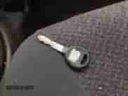 2000 Dodge Neon Highline z VIN 1B3ES46C3YD810978, wystawiony jako IAAI lot #42736464 z przebiegiem 140 712 mil mil oraz . Historia ofert i sprzedaży dostępna na DreamBid. Obrazek 11.