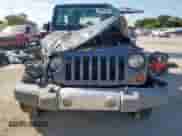 2008 Jeep Wrangler Sahara с VIN 1J4FA54128L605732, выставлен на аукционе Copart как лот 66987395 с пробегом 46 373 миль миль и Списание • Salvage title. История ставок и продаж доступна на DreamBid. Изображение 5.