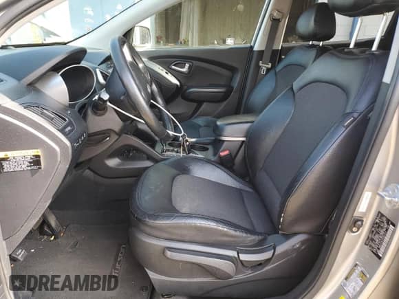 2012 Hyundai Tucson GLS with VIN KM8JUCAC3CU541913, listed as a Copart auction lot 71638385 with 154,883 mi miles and Salvage title. Bid and sale history available at DreamBid. Image 7.