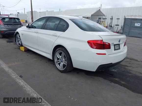 2014 BMW 5 Series 535d xDrive with VIN WBAFV3C57ED684014, listed as a IAAI auction lot 42056171 with 135,386 mi miles and . Bid and sale history available at DreamBid. Image 3.