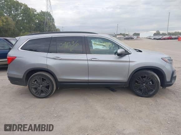 2021 Honda Pilot Special Edition с VIN 5FNYF6H27MB099336, выставлен на аукционе IAAI как лот 43080994 с пробегом 27 423 миль миль и . История ставок и продаж доступна на DreamBid. Изображение 13.