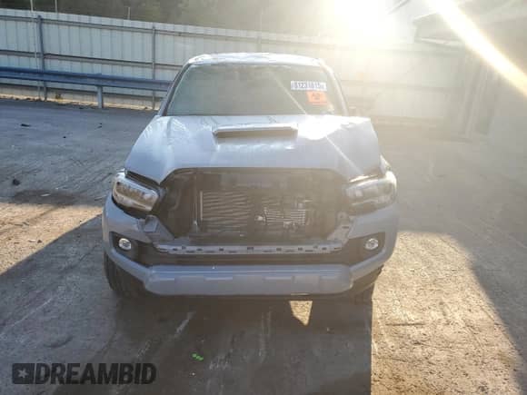 2020 Toyota Tacoma SR5 с VIN 3TMCZ5AN3LM319694, выставлен на аукционе Copart как лот 81231815 с пробегом Не указан миль и Списание • Salvage title. История ставок и продаж доступна на DreamBid. Изображение 5.