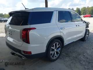 2021 Hyundai Palisade SEL z VIN KM8R34HEXMU290425, wystawiony jako IAAI lot #43286606 z przebiegiem 90 694 mil mil oraz . Historia ofert i sprzedaży dostępna na DreamBid. Obrazek 4.