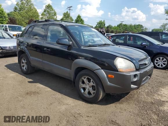 2009 Hyundai Tucson Limited with VIN KM8JN72D09U986534, listed as a Copart auction lot 62516985 with 153,253 mi miles and Salvage title. Bid and sale history available at DreamBid. Image 4.