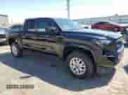 2024 Toyota Tacoma SR5 with VIN 3TMLB5JNXRM054298, listed as a Copart auction lot 66528135 with 5,976 mi miles and Salvage title. Bid and sale history available at DreamBid. Image 4.