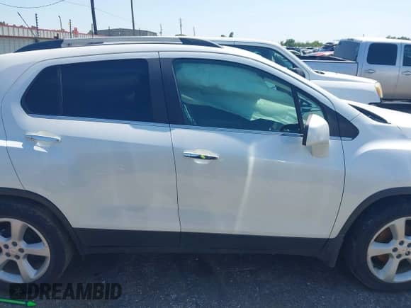 2015 Chevrolet Trax LTZ with VIN KL7CJNSB6FB194324, listed as a IAAI auction lot 43175847 with 109,899 mi miles and . Bid and sale history available at DreamBid. Image 13.