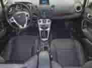 2015 Ford Fiesta SE z VIN 3FADP4BJ5FM118020, wystawiony jako Copart lot #69458035 z przebiegiem 100 895 mil mil oraz Czysty tytuł • Clean title. Historia ofert i sprzedaży dostępna na DreamBid. Obrazek 8.