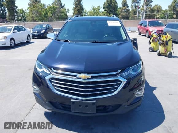 2020 Chevrolet Equinox Premier z VIN 2GNAXXEV2L6196670, wystawiony jako IAAI lot #42640318 z przebiegiem 52 343 mil mil oraz . Historia ofert i sprzedaży dostępna na DreamBid. Obrazek 12.