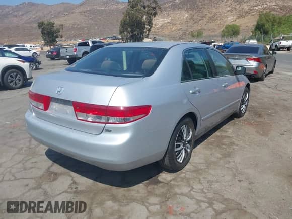2004 Honda Accord LX with VIN 1HGCM66304A051991, listed as a IAAI auction lot 42898880 with 98,708 mi miles and . Bid and sale history available at DreamBid. Image 4.