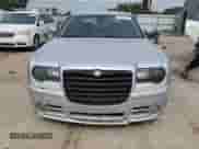 2007 Chrysler 300 C SRT-8 with VIN 2C3LA73W17H617839, listed as a Copart auction lot 60858475 with 180,655 mi miles and Salvage title. Bid and sale history available at DreamBid. Image 13.