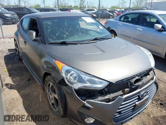 2013 Hyundai Veloster Turbo с VIN KMHTC6AE9DU117443, выставлен на аукционе IAAI как лот 42075295 с пробегом 189 471 миль миль и . История ставок и продаж доступна на DreamBid. Изображение 1.