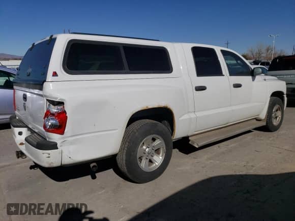2008 Dodge Dakota SLT с VIN 1D7HW48K28S507616, выставлен на аукционе Copart как лот 42907415 с пробегом 238 511 миль миль и Списание • Salvage title. История ставок и продаж доступна на DreamBid. Изображение 3.
