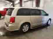 2013 Dodge Grand Caravan Crew with VIN 2C4RDGDG6DR700029, listed as a Copart auction lot 69057705 with 64,797 mi miles and Salvage title. Bid and sale history available at DreamBid. Image 3.