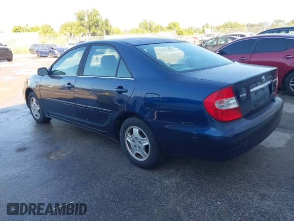 2002 Toyota Camry XLE с VIN 4T1BF32K62U511257, выставлен на аукционе IAAI как лот 43451080 с пробегом 147 569 миль миль и . История ставок и продаж доступна на DreamBid. Изображение 3.