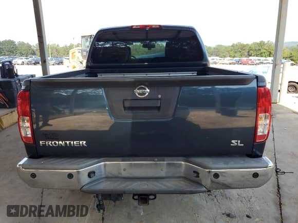 2013 Nissan Frontier SL with VIN 1N6AD0ER2DN712919, listed as a Copart auction lot 62019235 with 242,539 mi miles and Salvage title. Bid and sale history available at DreamBid. Image 6.