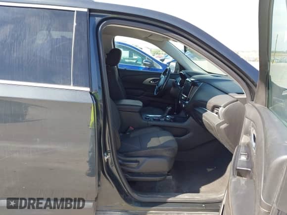 2018 Chevrolet Traverse LT Cloth with VIN 1GNEVGKW1JJ216797, listed as a IAAI auction lot 43323530 with 128,540 mi miles and . Bid and sale history available at DreamBid. Image 5.