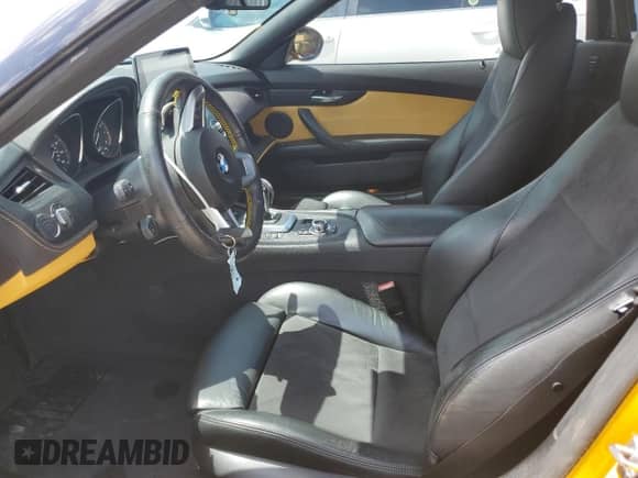 2013 BMW Z4 sDrive28i with VIN WBALL5C59DJ104203, listed as a Copart auction lot 59781425 with 116,002 mi miles and Salvage title. Bid and sale history available at DreamBid. Image 7.