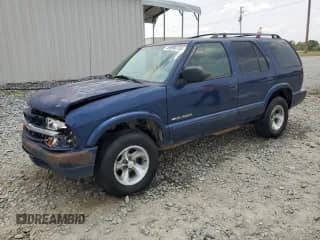 2002 Chevrolet Blazer LS z VIN 1GNCS13W82K134525, wystawiony jako Copart lot #59090735 z przebiegiem 252 637 mil mil oraz Szkoda całkowita • Salvage title. Historia ofert i sprzedaży dostępna na DreamBid. Obrazek 1.