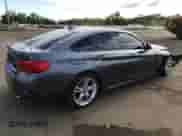 2018 BMW 4 Series 440i xDrive with VIN WBA4J7C57JBH14938, listed as a Copart auction lot 65267015 with 94,624 mi miles and Salvage title. Bid and sale history available at DreamBid. Image 3.