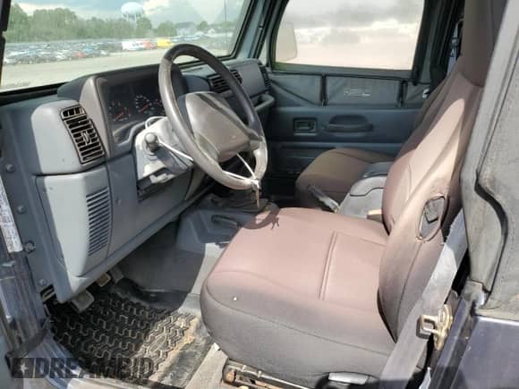 2001 Jeep Wrangler SE with VIN 1J4FA29P41P355548, listed as a Copart auction lot 56214205 with 173,125 mi miles and Clean title. Bid and sale history available at DreamBid. Image 7.