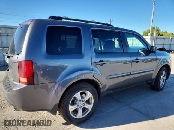 2014 Honda Pilot EX-L z VIN 5FNYF4H55EB054900, wystawiony jako Copart lot #82346645 z przebiegiem 158 454 mil mil oraz Szkoda całkowita • Salvage title. Historia ofert i sprzedaży dostępna na DreamBid. Obrazek 3.