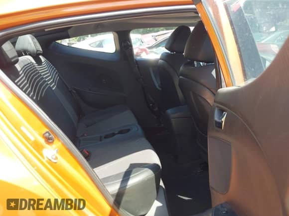 2013 Hyundai Veloster w/Black Int z VIN KMHTC6AD8DU175373, wystawiony jako IAAI lot #42567057 z przebiegiem 141 693 mil mil oraz . Historia ofert i sprzedaży dostępna na DreamBid. Obrazek 8.