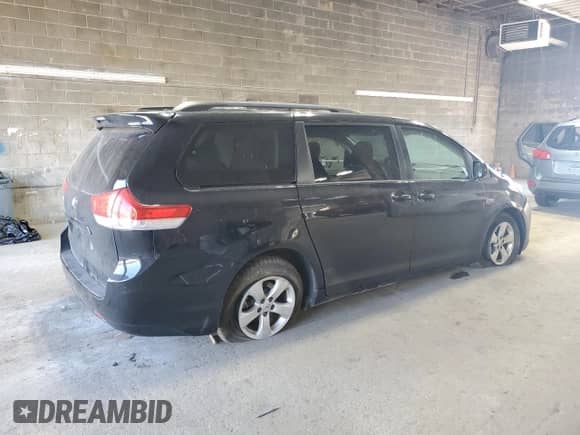 2011 Toyota Sienna LE с VIN 5TDKK3DC7BS010324, выставлен на аукционе Copart как лот 80947105 с пробегом 190 567 миль миль и Списание • Salvage title. История ставок и продаж доступна на DreamBid. Изображение 3.