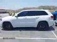 2018 Jeep Grand Cherokee Trackhawk z VIN 1C4RJFN92JC452997, wystawiony jako IAAI lot #42439334 z przebiegiem 49 532 mil mil oraz . Historia ofert i sprzedaży dostępna na DreamBid. Obrazek 14.