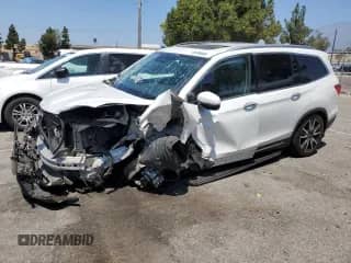 2020 Honda Pilot Touring 8-Passenger с VIN 5FNYF5H92LB005918, выставлен на аукционе Copart как лот 65788835 с пробегом 114 502 миль миль и Списание • Salvage title. История ставок и продаж доступна на DreamBid. Изображение 1.