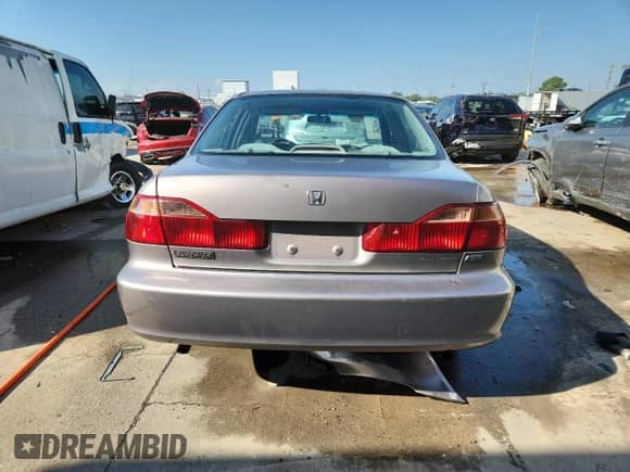 2000 Honda Accord LX с VIN 1HGCG1641YA048168, выставлен на аукционе Copart как лот 80166065 с пробегом 64 489 миль миль и Списание • Salvage title. История ставок и продаж доступна на DreamBid. Изображение 6.